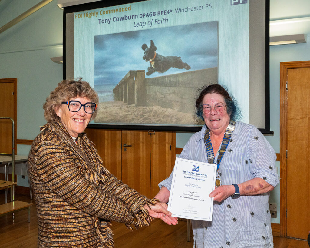 Sandie Cox presents Tony Cowburn's certificate