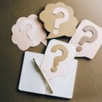 question marks on craft paper